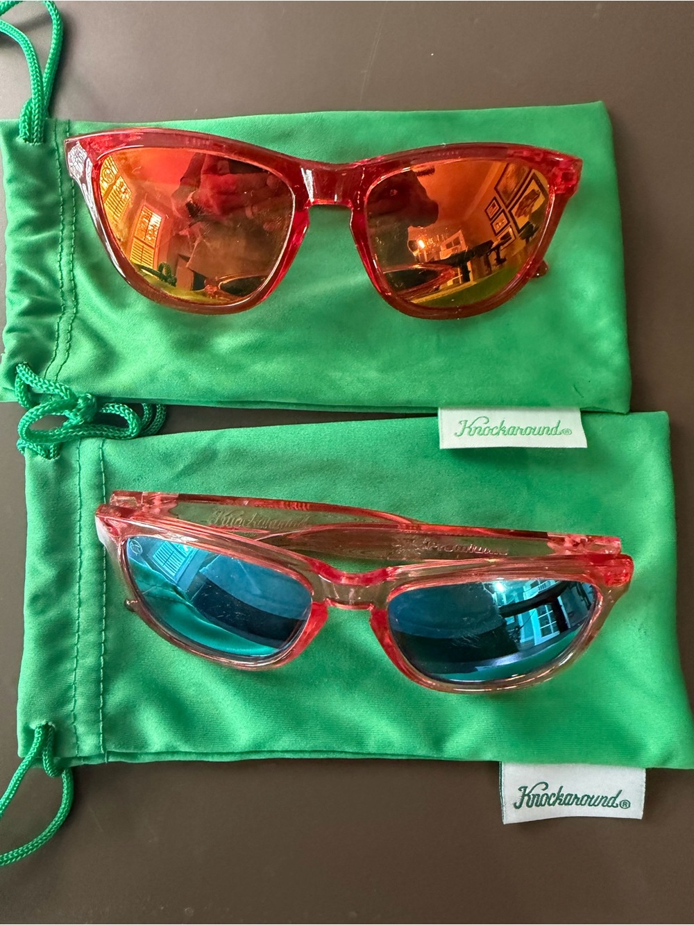 Kids Red Transparent KNOCKAROUND Sunglasses with Mirrored Lenses. Two pair.